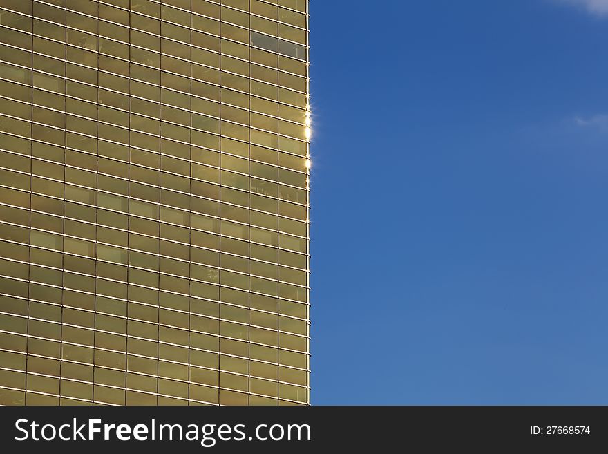 Glass textured pattern and blue sky from office building