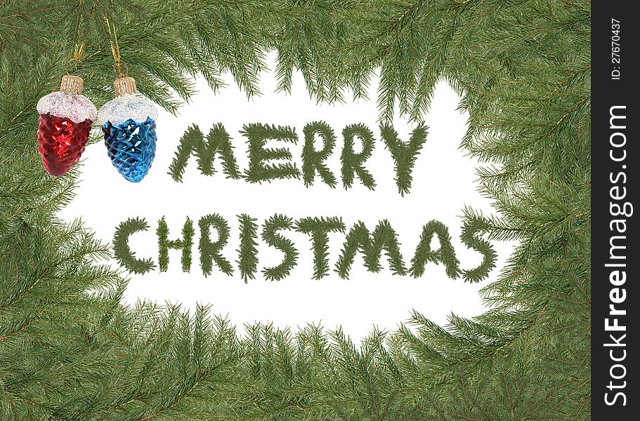 Merry Christmas inscription made from lot of spruce branches