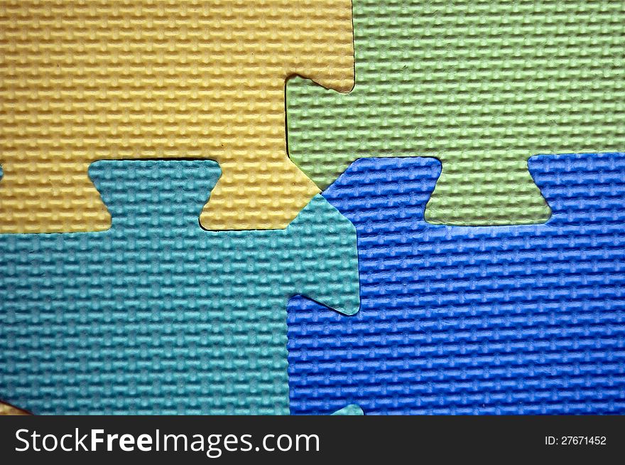 A close-up of jigsaw pieces. A close-up of jigsaw pieces
