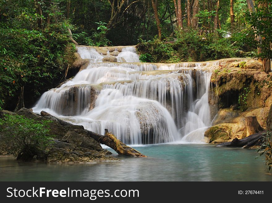 The cascading Erawan waterfall in Erawan National Park near Kanchanaburi in Thailand. The cascading Erawan waterfall in Erawan National Park near Kanchanaburi in Thailand.