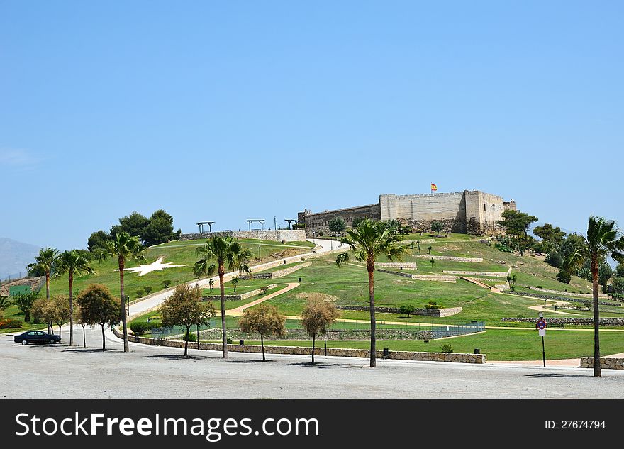 Ancient castle on the green hill of the Costa del Sol. Ancient castle on the green hill of the Costa del Sol