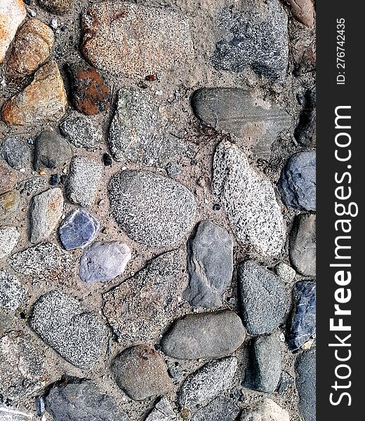 Dirt Road. Rubble On The Ground. Crushed Stone Of Gray, Brick, White And Black Colors