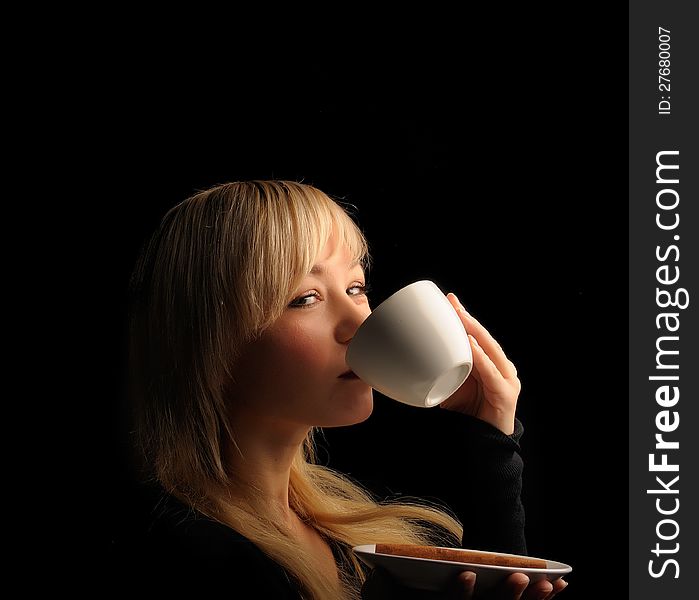 Young  Woman With Coffe  On A Dark Background
