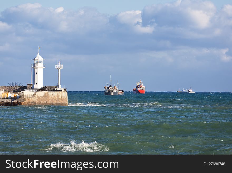 Ships on the roads of port during storms