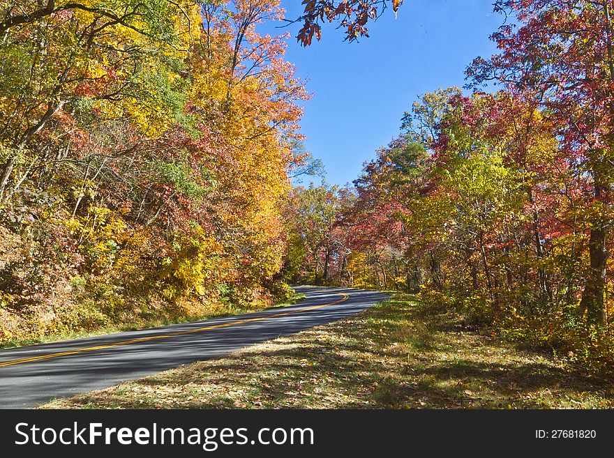 Colorful fall foliage along scenic highway. Colorful fall foliage along scenic highway.