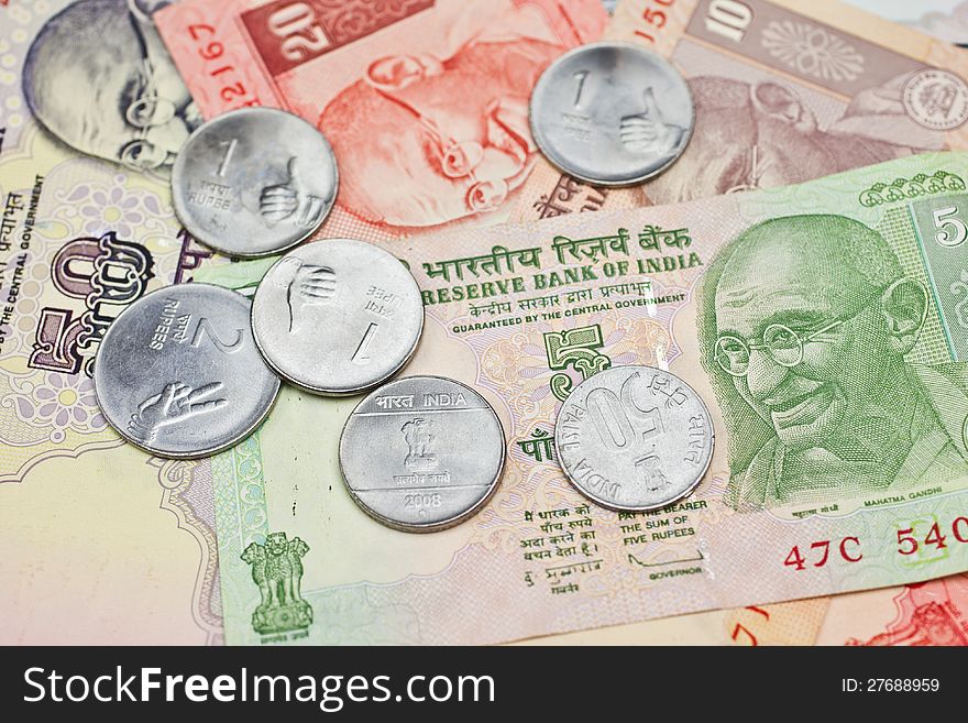 Small bills and loose change in Indian Rupees. Small bills and loose change in Indian Rupees.