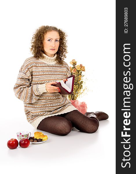 Girl in a sweater reading book bible. Girl in a sweater reading book bible