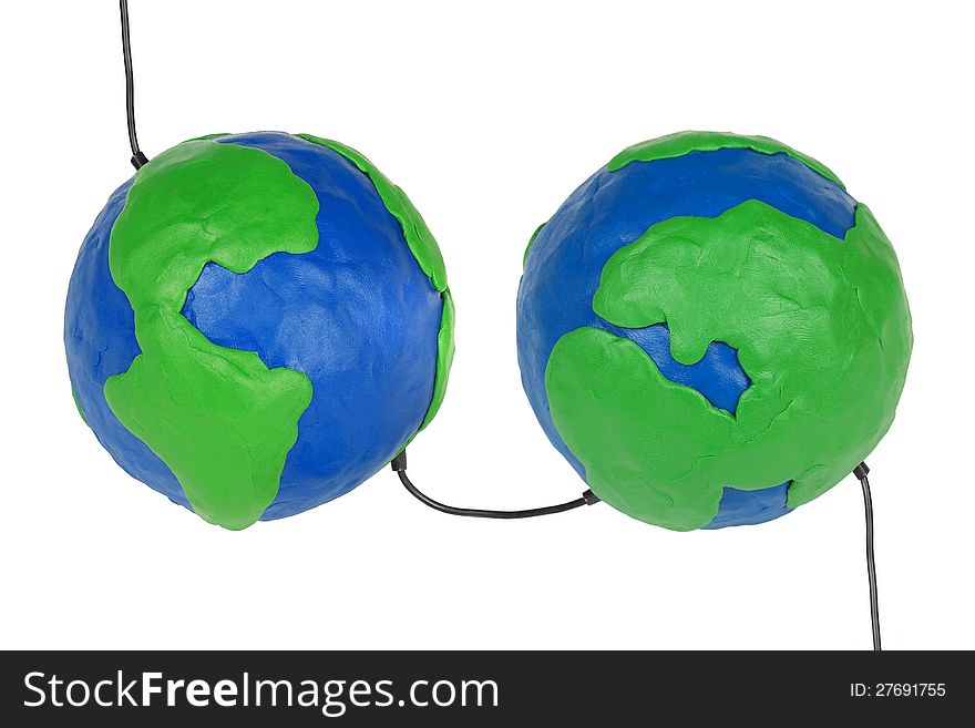 Two plasticine Hemisphere land with wires on a white background. Two plasticine Hemisphere land with wires on a white background