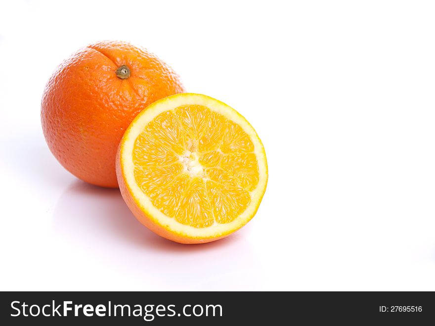 Fresh healthy Oranges lying on white background