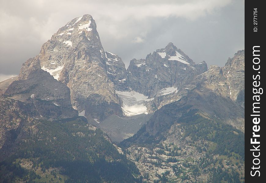 A massive snow field high up in the Teton range. A massive snow field high up in the Teton range.