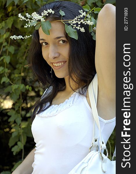 Attractive girl with flowers wreath on head. Attractive girl with flowers wreath on head