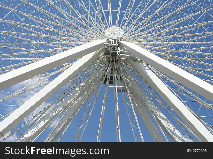Ferris Wheel Center against a blue sky