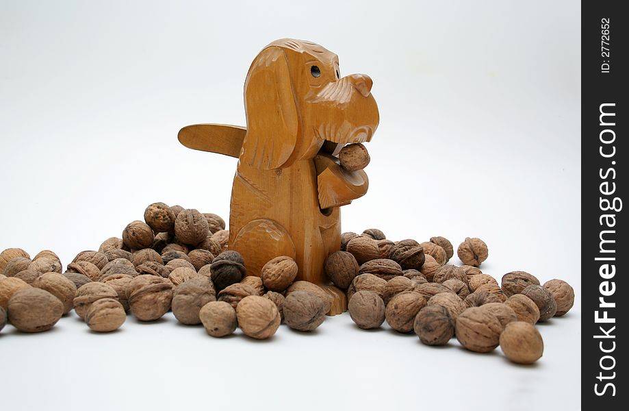 Wooden nutcracker dog with walnuts