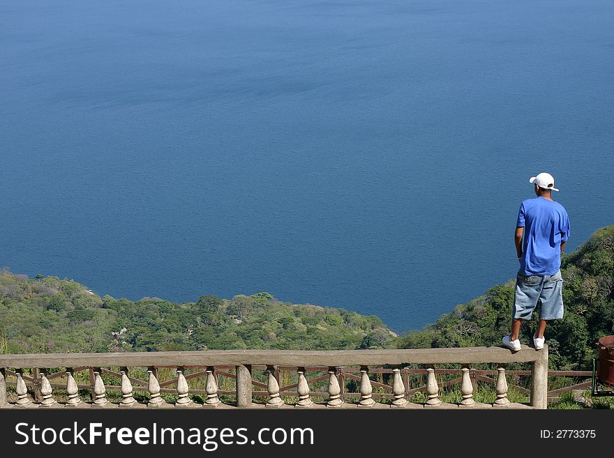 Guy watching over Laguna Apoyo in Nicaragua