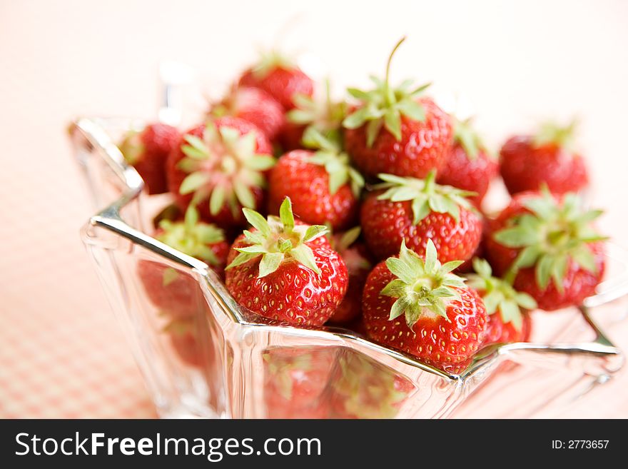 Fresh strawberries in star shaped glass bowl