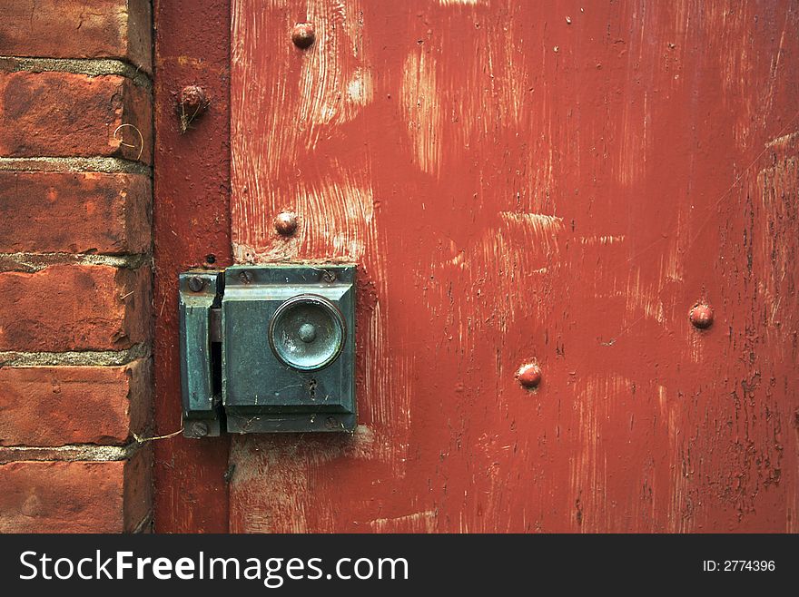 Close-up Of Doorknob And Brick