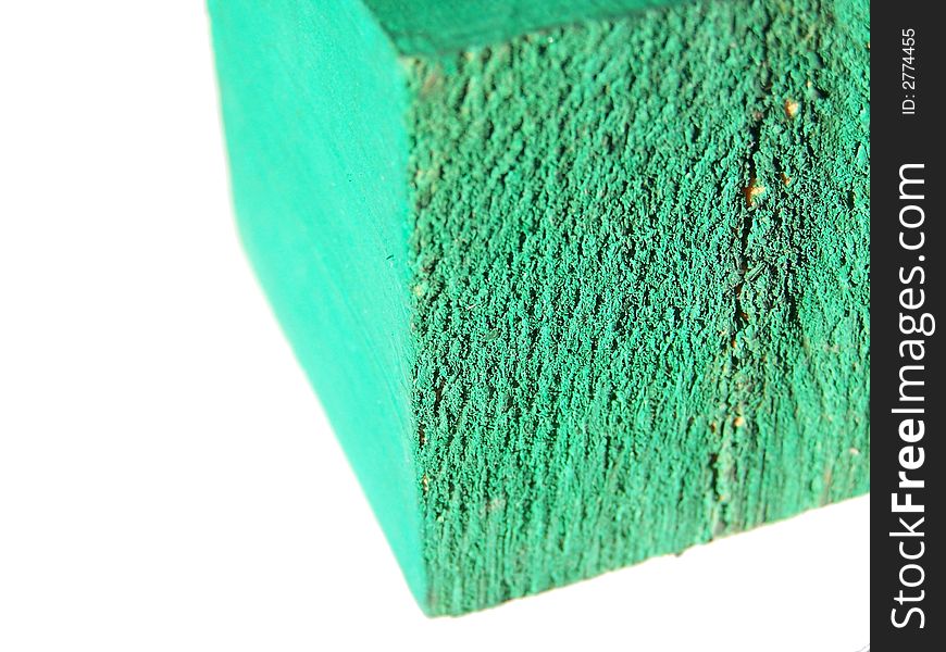 Green Cubic block made of wood. Green Cubic block made of wood.