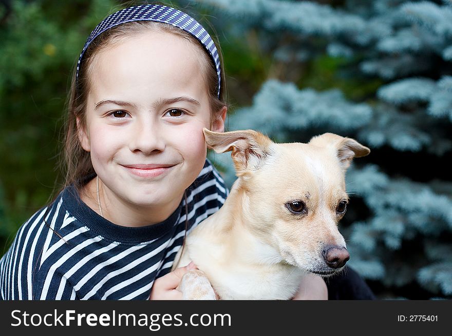 Smiling girl and dog