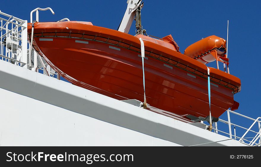 A fast rescue craft in position on a ferry.