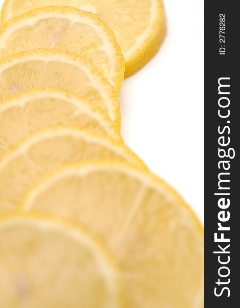 Slices of lemon on the white background