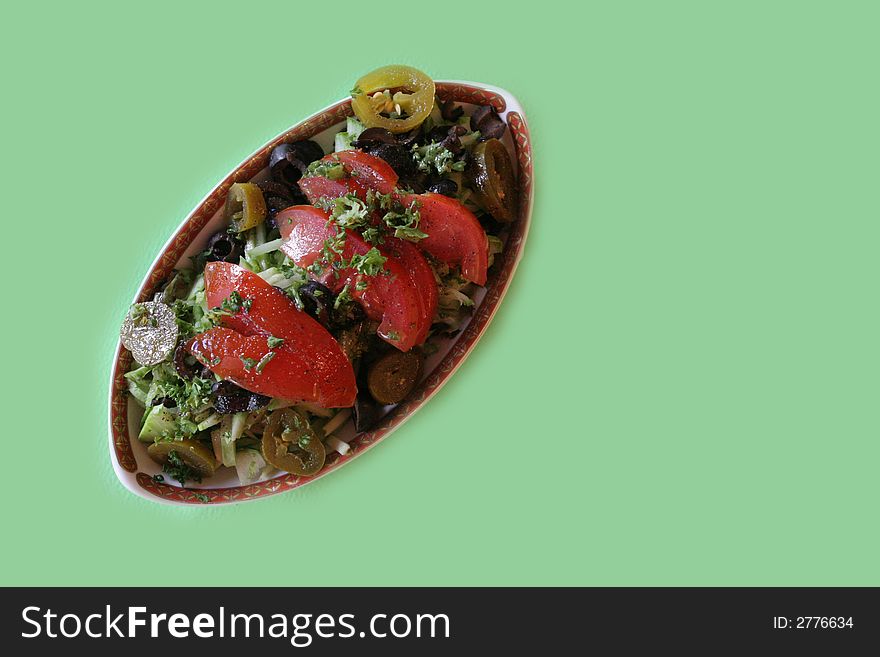 Middle Eastern dish isolated on green