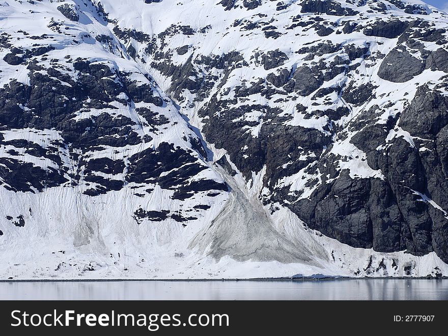 Snow is melting down on late spring in Glacier Bay national park, Alaska. Snow is melting down on late spring in Glacier Bay national park, Alaska.