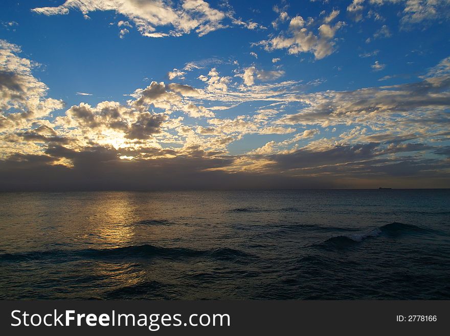 Sunset Over The Sea