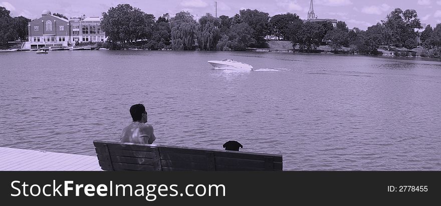 Man And His Dog Watching Boat