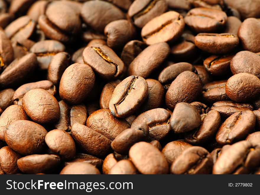 Fried grains of  Arabian coffee,  close up. Fried grains of  Arabian coffee,  close up