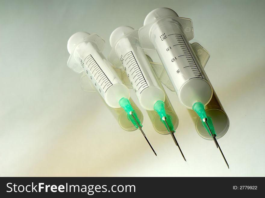 Three disposable syringes are isolated on  white background. Three disposable syringes are isolated on  white background