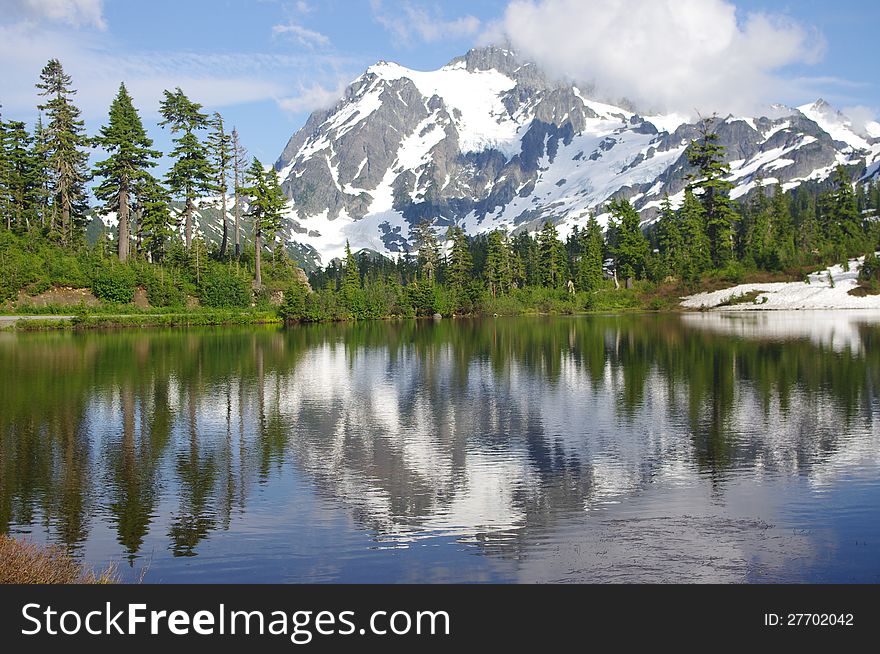 Mount Shuksan with a reflection in a picture lake in Washington State USA