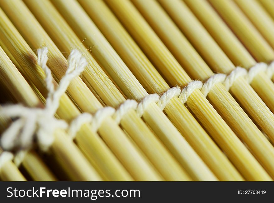 A bamboo mat tied with cotton rope. A bamboo mat tied with cotton rope.