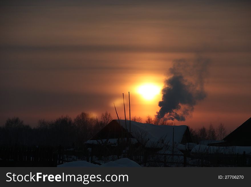 Winter sunset in russian village. Winter sunset in russian village