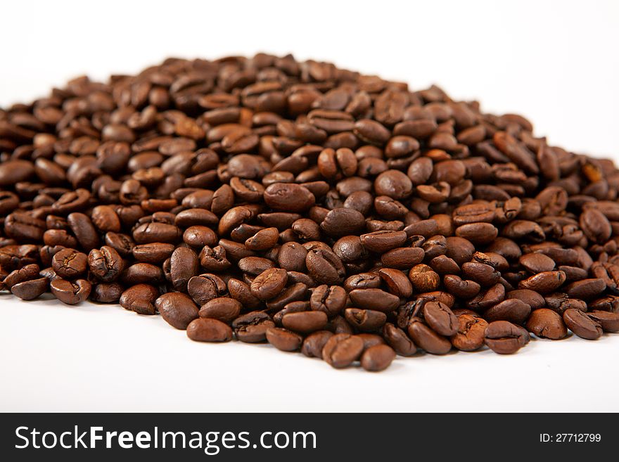 Cup of coffe with coffee beans on a white background. Cup of coffe with coffee beans on a white background