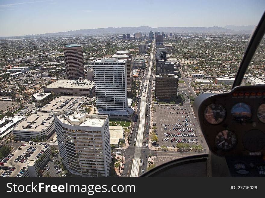 Helicopter view through the bubble at the light rail path along Central Avenue in Phoenix, Arizona