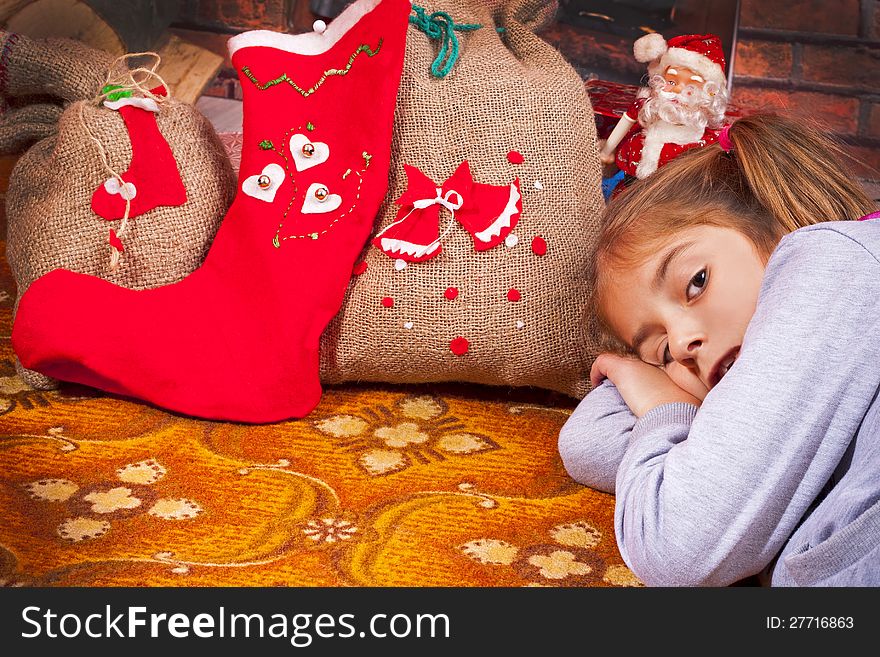 Little girl with a Christmas gift-holiday