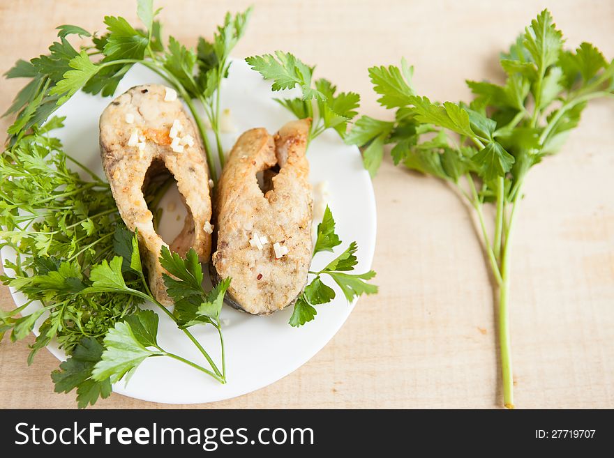 Two fillets baked fish, carp