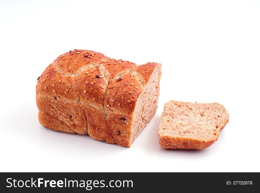 Loaf of dark bread with sesame seeds