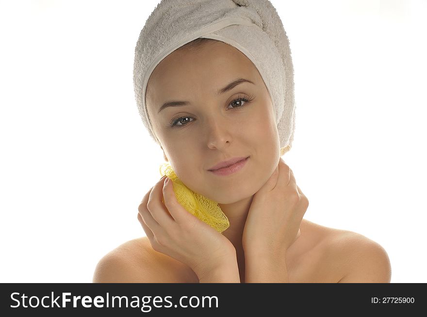 Beautiful woman washing your neck yellow sponge