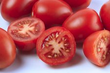 Group Of Sliced And Whole Tomatoes Royalty Free Stock Photography