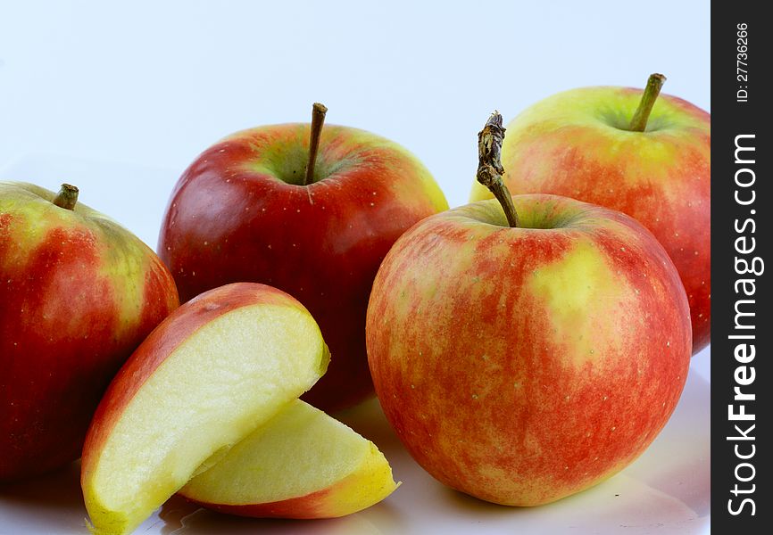 A couple of Dutch Elstar apples and a sliced apple
