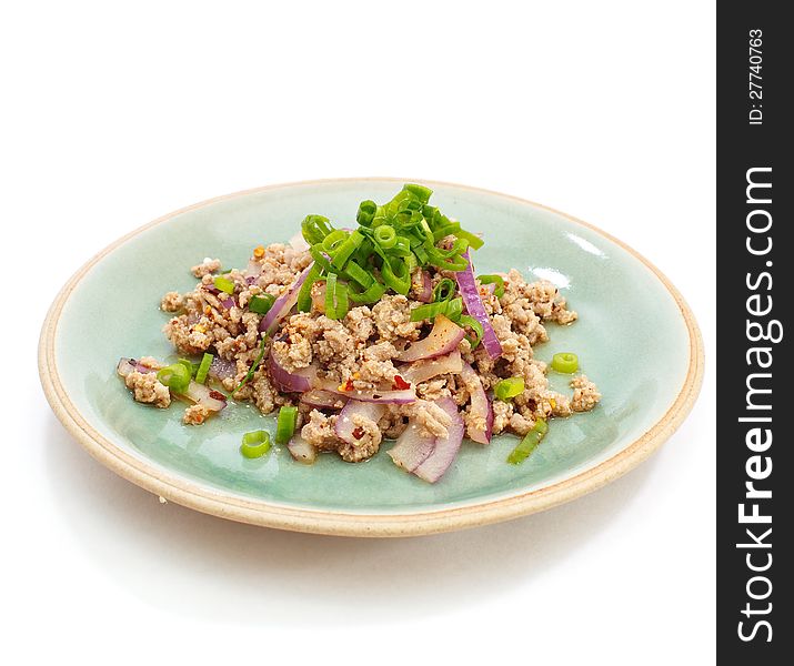 Spicy minced pork salad , Thai food on white background