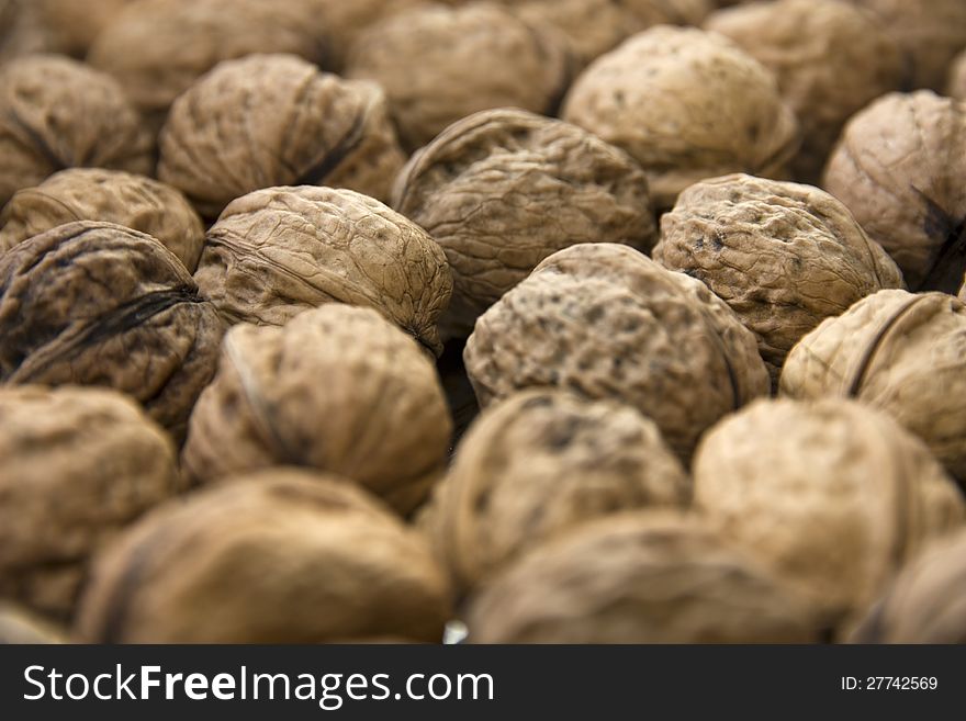 Paddy brown nuts, detail walnuts. Paddy brown nuts, detail walnuts
