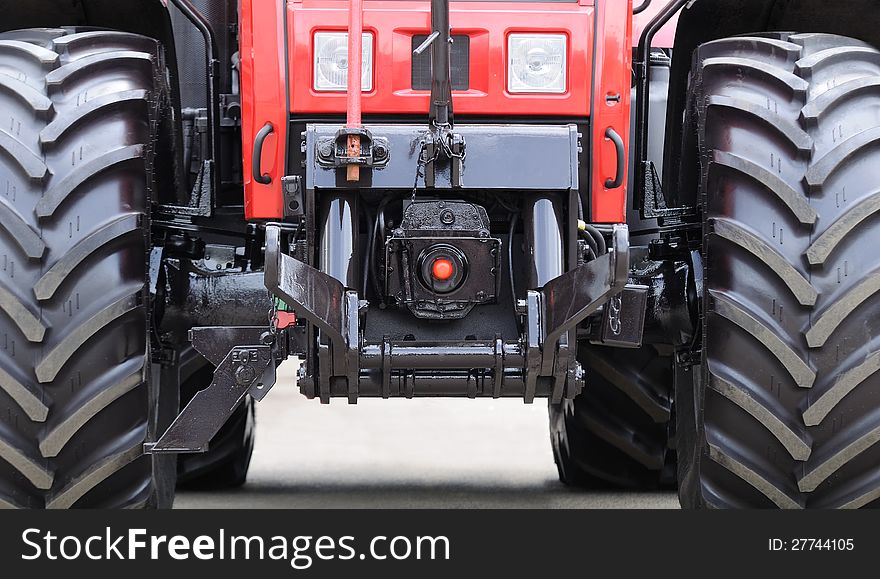 A close-up of a brand new modern tractor. A close-up of a brand new modern tractor