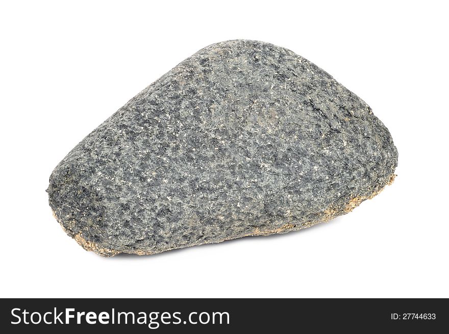 A gray stone isolated on a white background - horizontal orientation. A gray stone isolated on a white background - horizontal orientation