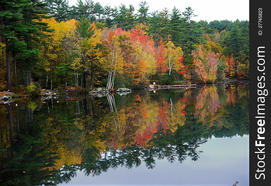 Fall foliage reflected in Lake Kanasatka, NH. Fall foliage reflected in Lake Kanasatka, NH