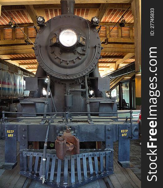 Close front view of a steam engine