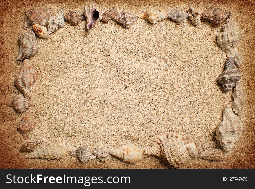 Frame made of seashells on the gold sand. Frame made of seashells on the gold sand