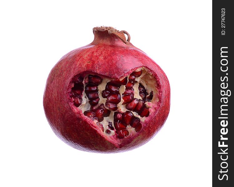 Pomegranate with heart isolated on white