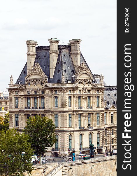 The Louvre Museum as seen across the Seine River, Paris, France